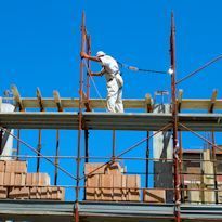 Worker on scaffold