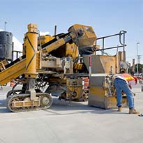 Heavy equipment conveyor in operation