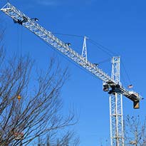 Large tower crane on construction site