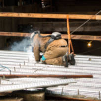 Worker wearing PPE while exposed to lead